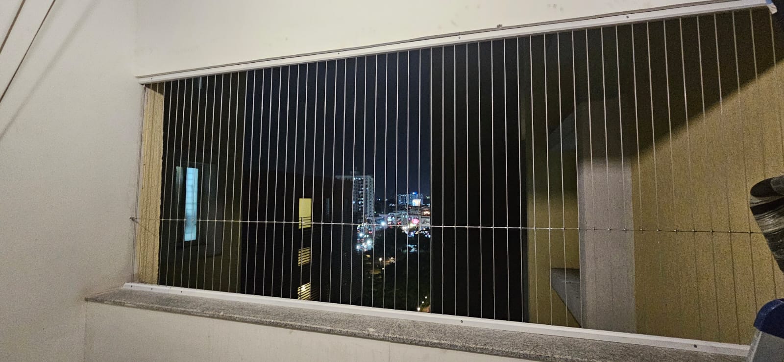 Apartment balcony invisible grills in a Chennai residential building